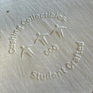 Pottery stamp - reads Cushing Collectibles Student Crafted