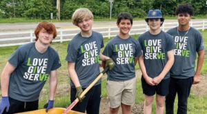 Five Cardinal Spellman students helping out with Cushing’s gardens and greenhouse.