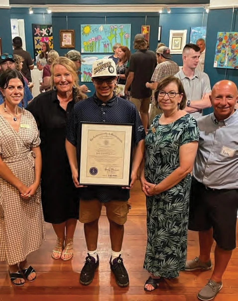 North River Arts Programs and Marketing Manager Julia Driscoll, Cushing President and CEO Michelle Markowitz, student Abdur Khan-Matos, North River Arts Executive Director Maureen Smith, and Randy Wiskow at the opening reception for Cushing’s exhibit.