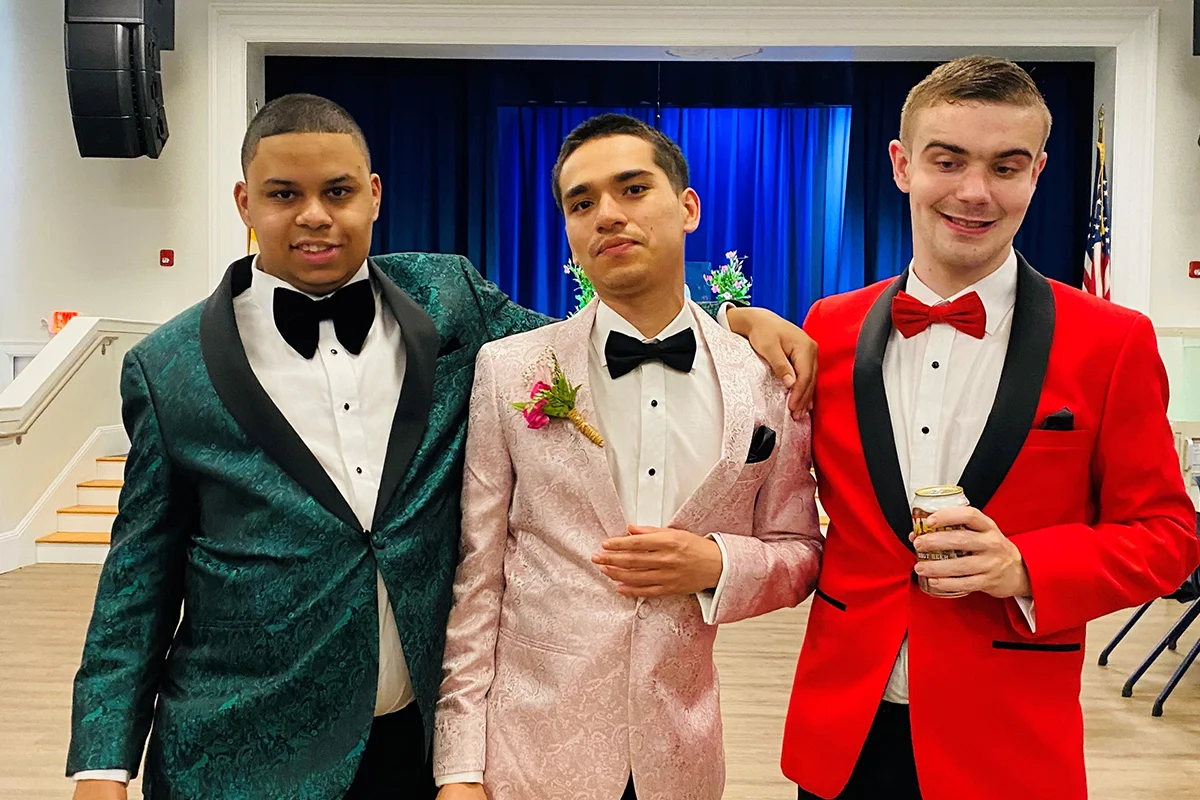 Group of Cushing students wearing Tuxedos at Prom