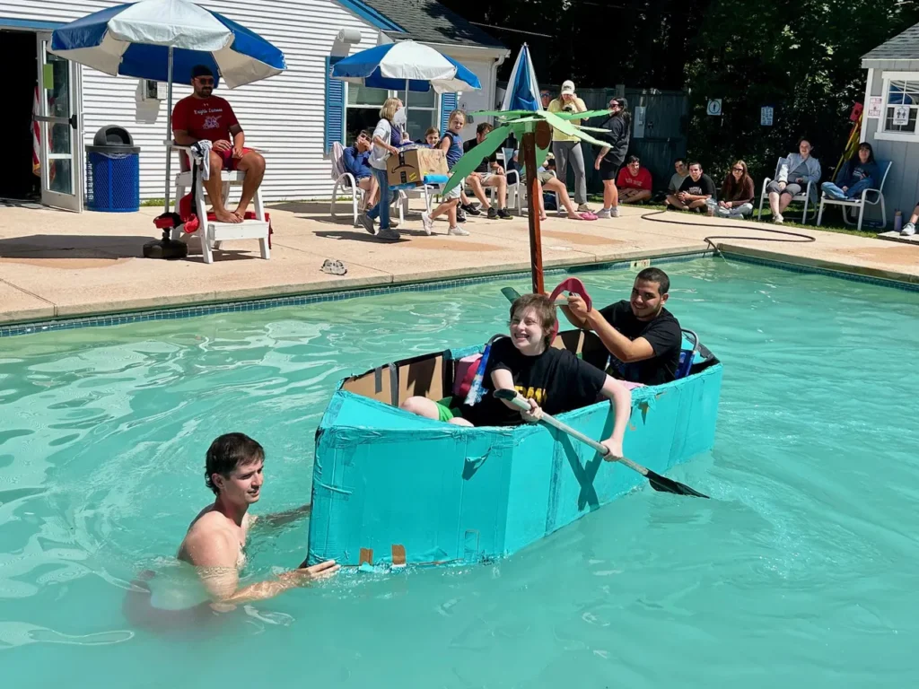 two students in a floating boat