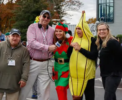 Fun Run participants dressed as a Christmas elf and a banana
