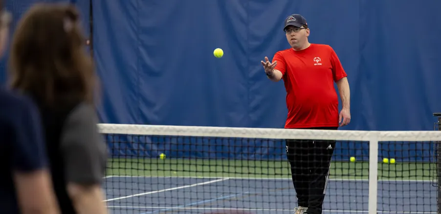 Henry Buxton enjoys playing tennis at the YMCA.