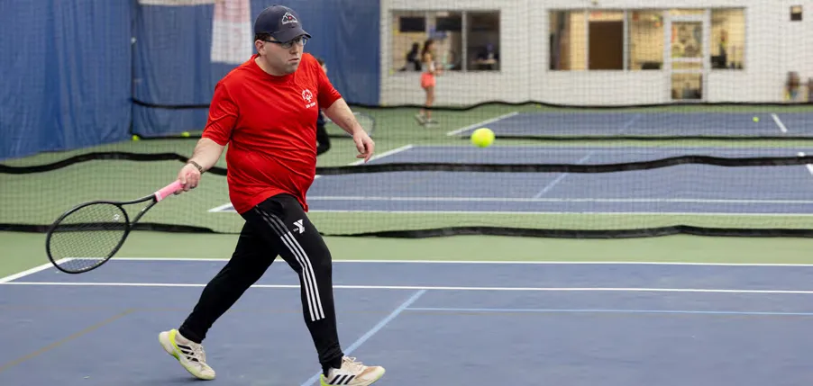 Henry Buxton enjoys playing tennis at the YMCA.