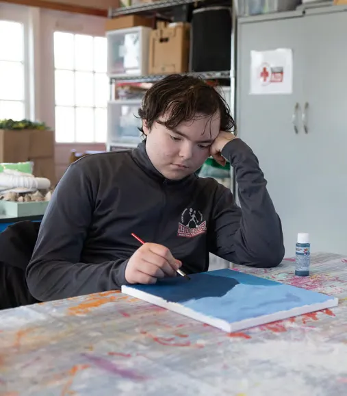 Matt Rippberger enjoys his art studio time at Cushing.