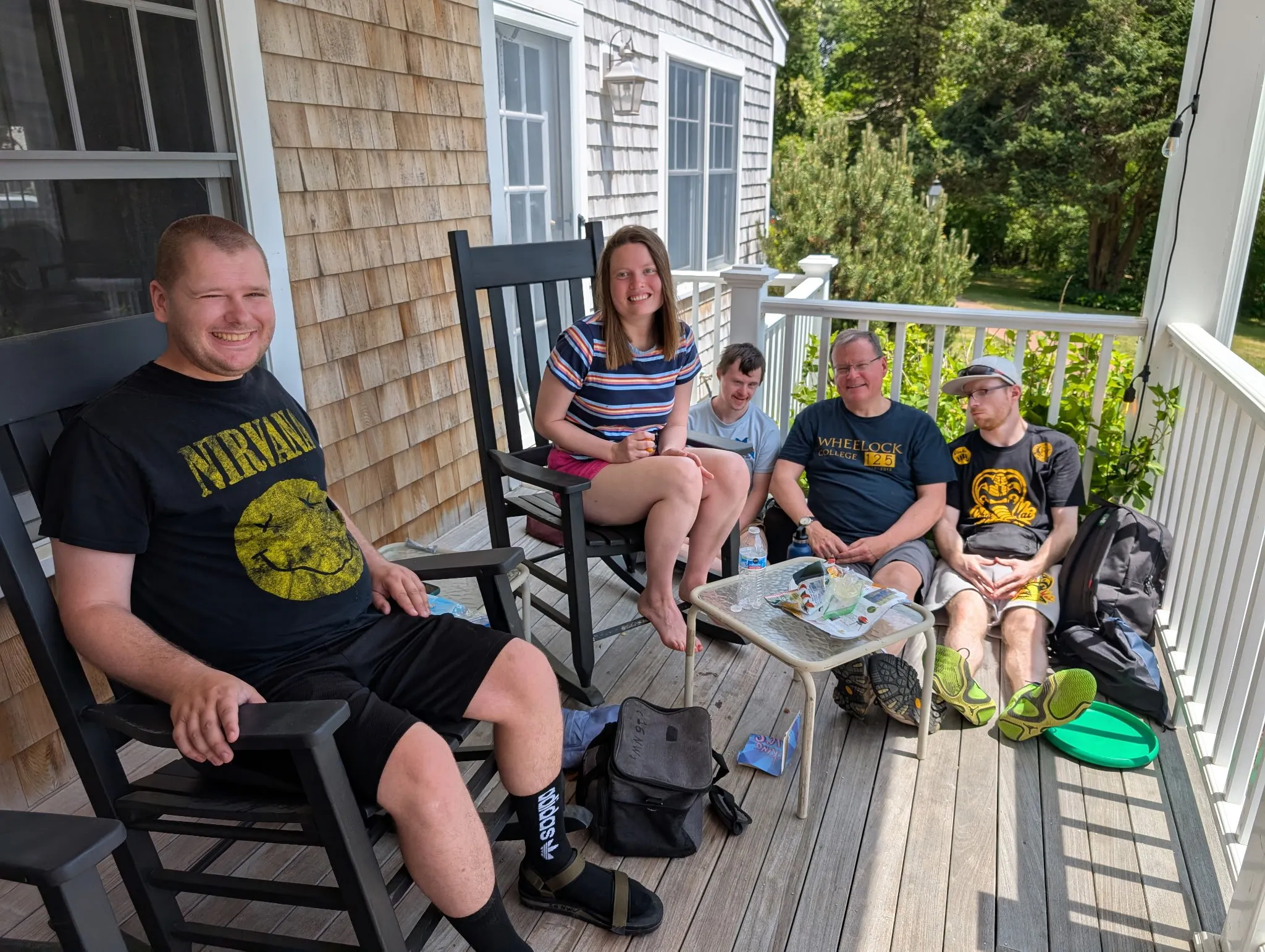 Duxbury Retreat group photo on a porch
