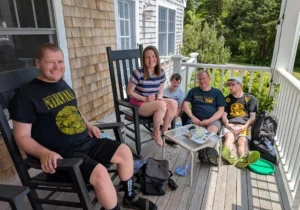 Duxbury Retreat group photo on a porch